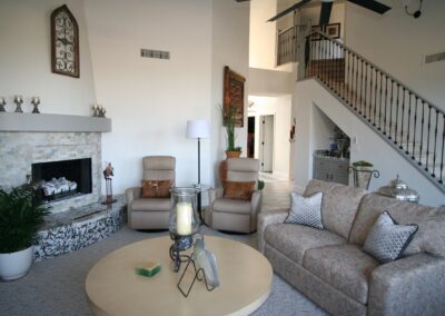 A living room with a fireplace.